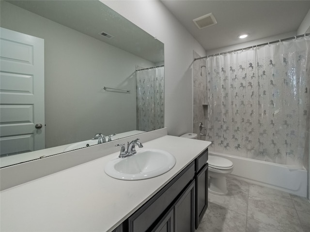 full bathroom with shower / tub combo with curtain, vanity, and toilet