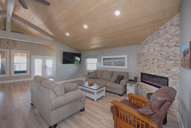 living room featuring french doors, a stone fireplace, wood ceiling, high vaulted ceiling, and light wood-type flooring