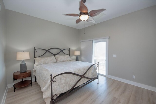 bedroom featuring light wood-style floors, access to outside, and baseboards