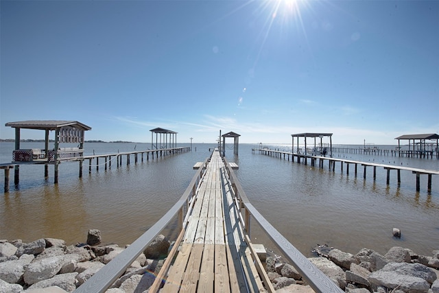 dock area featuring a water view