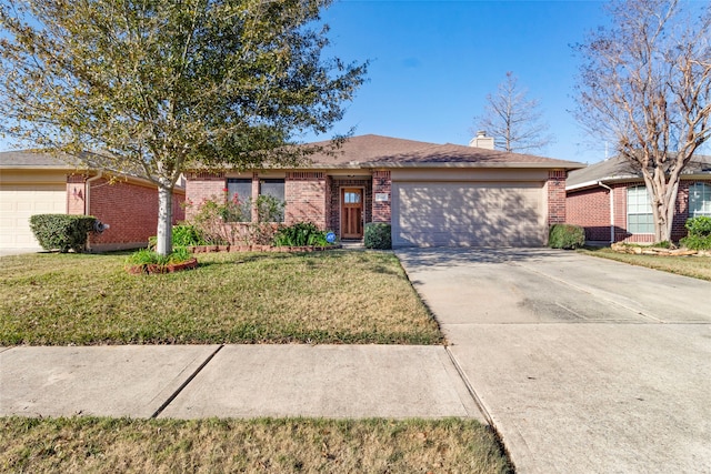 ranch-style house featuring a front lawn and a garage