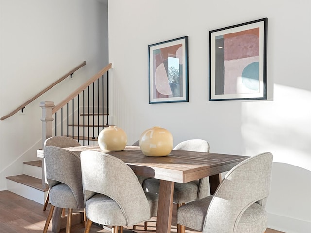 dining area featuring wood-type flooring