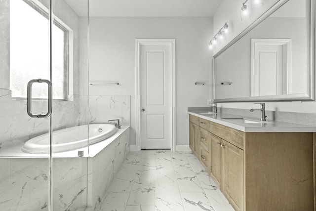 bathroom featuring baseboards, double vanity, a bath, marble finish floor, and a sink