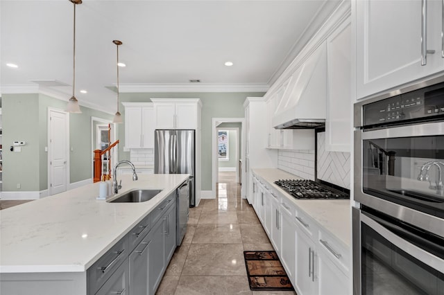 kitchen with white cabinetry, sink, hanging light fixtures, and gray cabinets