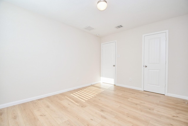 empty room featuring light hardwood / wood-style flooring