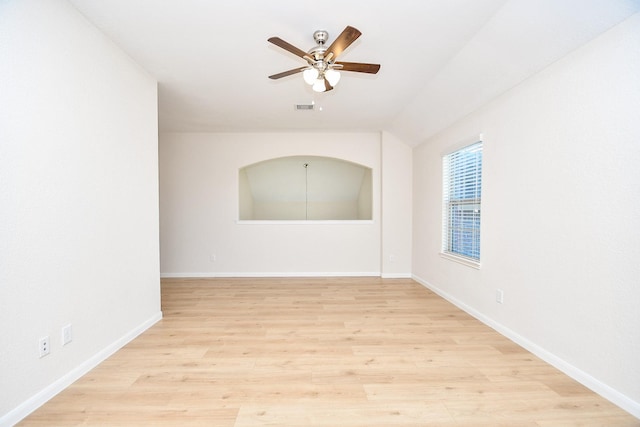 empty room featuring ceiling fan and light hardwood / wood-style floors