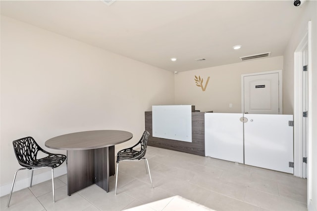 dining room with light tile patterned floors