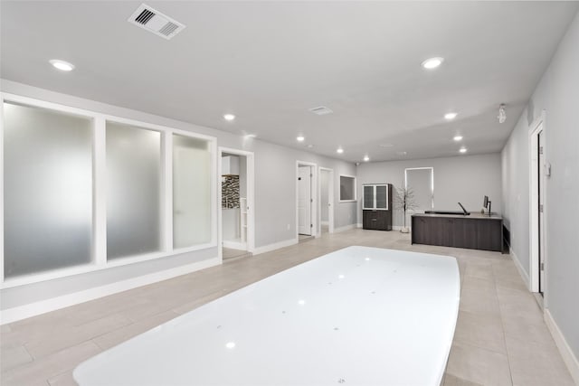 interior space featuring light tile patterned flooring