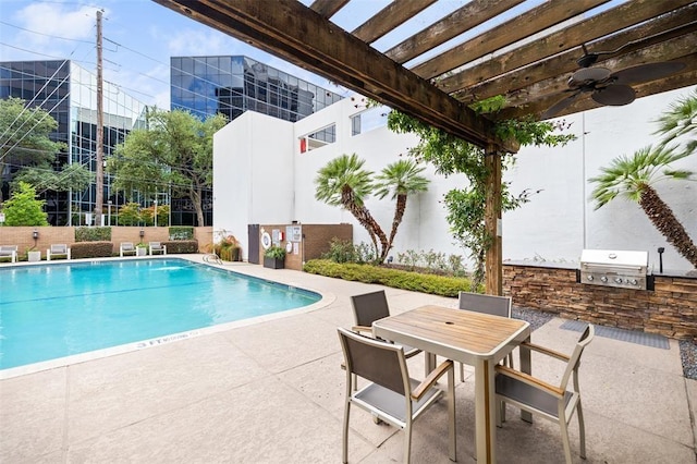 view of pool with a patio area, a grill, ceiling fan, area for grilling, and a pergola