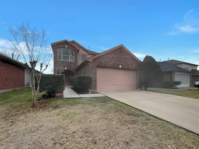 view of front facade with a garage and a front yard