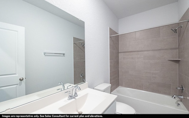 full bathroom with toilet, vanity, and tiled shower / bath combo