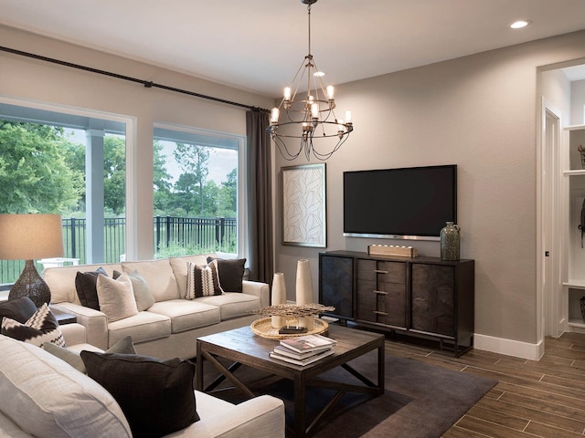 living room featuring a notable chandelier