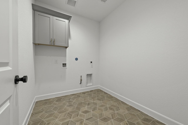 laundry area with cabinet space, visible vents, gas dryer hookup, washer hookup, and electric dryer hookup