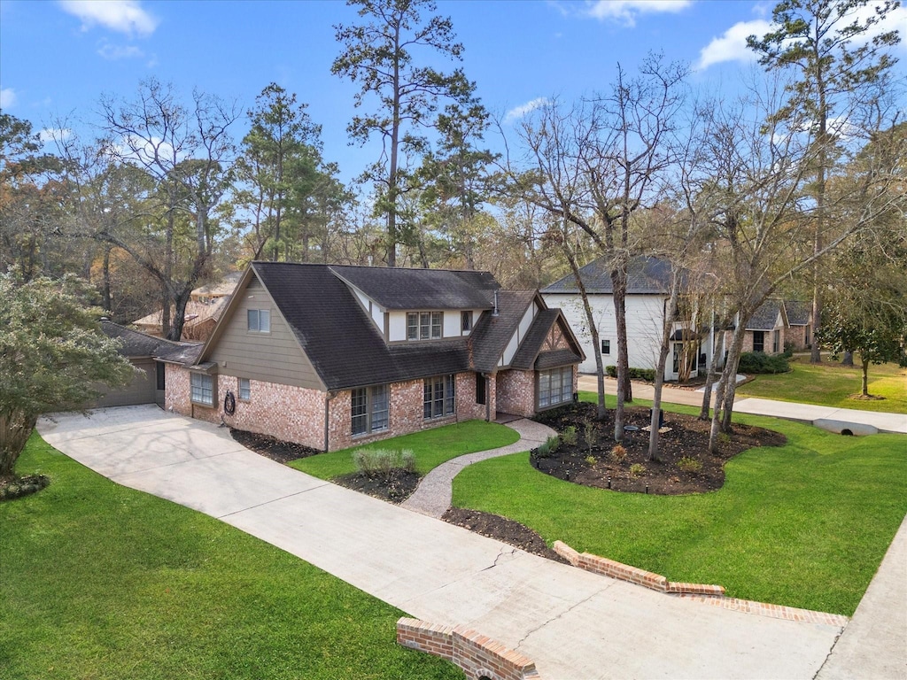 7 Postvine Ct, The Woodlands, TX 77381 - view of front of property with a front yard
