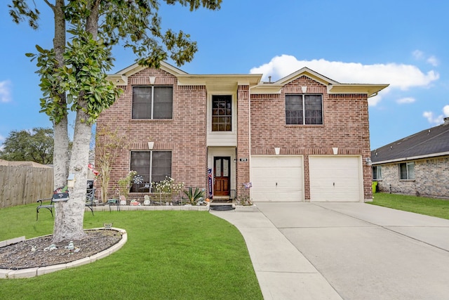 1711 Village Court Ln, Rosenberg, TX 77471 - traditional-style house featuring a front lawn, driveway, brick siding, and a garage