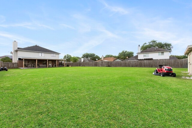 1711 Village Court Ln, Rosenberg, TX 77471 - view of yard featuring a fenced backyard