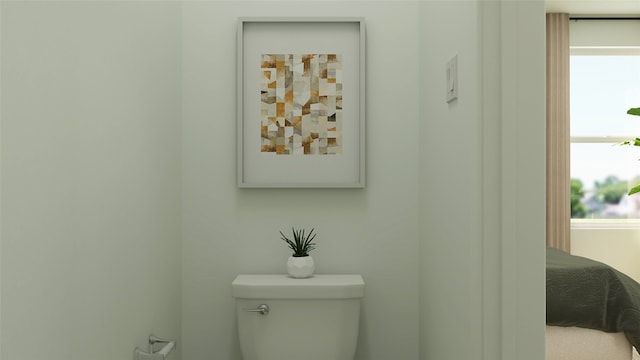 bathroom featuring toilet and plenty of natural light