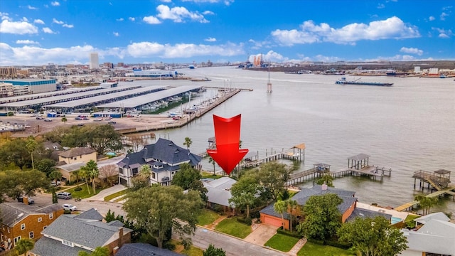 birds eye view of property featuring a water view