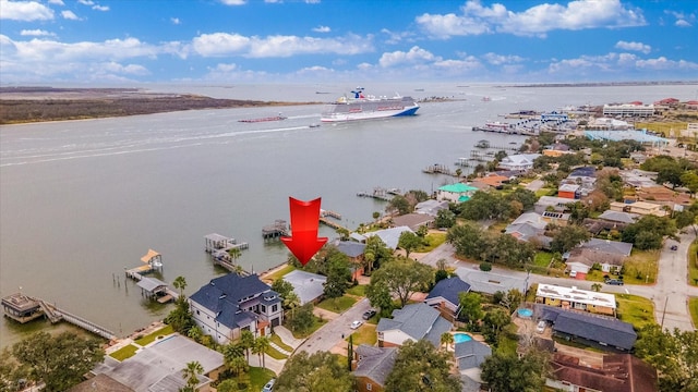 drone / aerial view with a water view