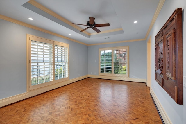 unfurnished room featuring ceiling fan, ornamental molding, light parquet flooring, and a raised ceiling