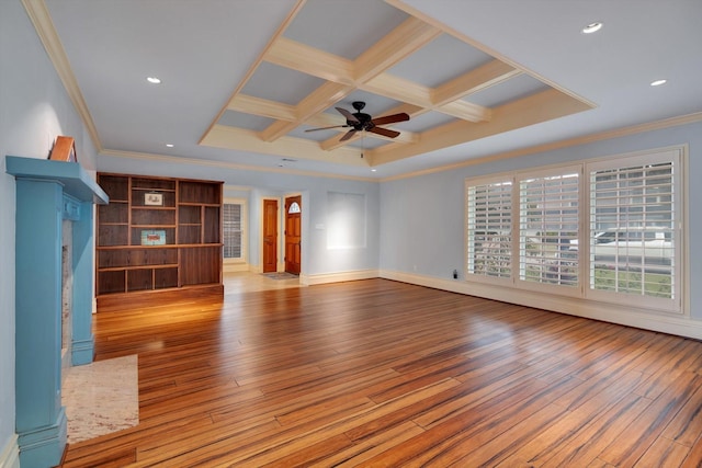 unfurnished living room with ceiling fan, beam ceiling, crown molding, coffered ceiling, and light hardwood / wood-style flooring