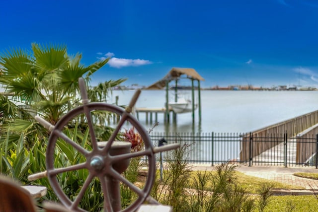 dock area with a water view