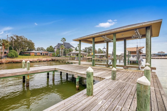 view of dock with a water view