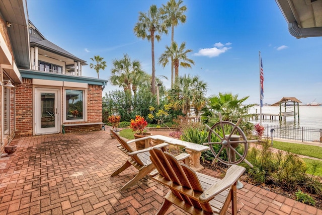 view of patio / terrace with a water view