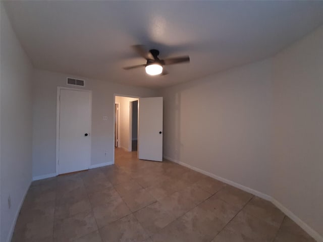 spare room featuring ceiling fan