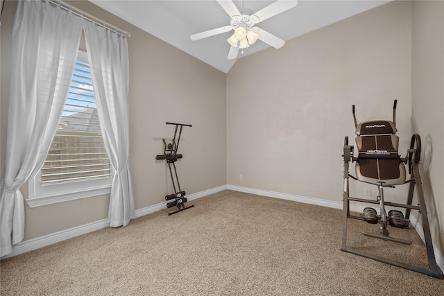 workout room with vaulted ceiling, ceiling fan, and carpet flooring