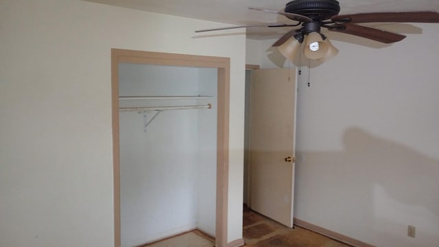 unfurnished bedroom featuring a closet and ceiling fan