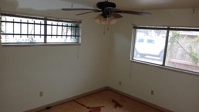 spare room with ceiling fan