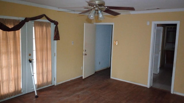 unfurnished room with ceiling fan, dark wood-type flooring, and ornamental molding