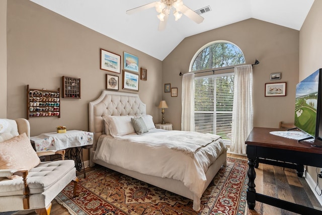 bedroom featuring vaulted ceiling, ceiling fan, and hardwood / wood-style floors