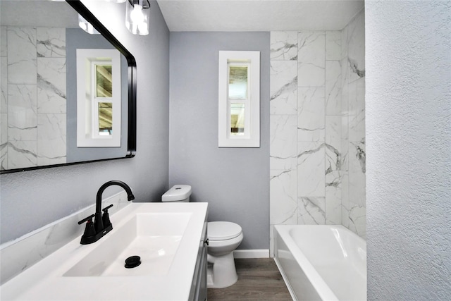 full bathroom with shower / bathtub combination, vanity, toilet, and wood-type flooring