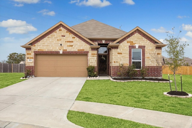 view of front facade featuring a garage and a front yard