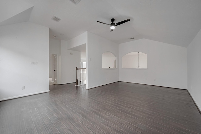 spare room with lofted ceiling, dark hardwood / wood-style floors, and ceiling fan