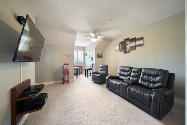 carpeted living room featuring ceiling fan, a textured ceiling, and lofted ceiling