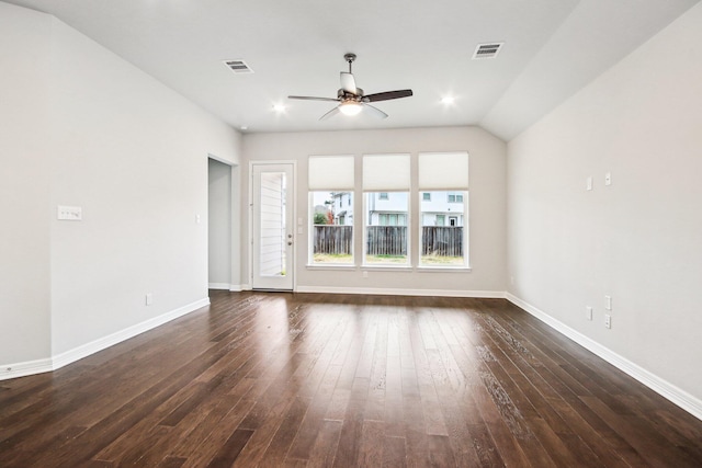 unfurnished living room with ceiling fan, vaulted ceiling, and dark hardwood / wood-style flooring