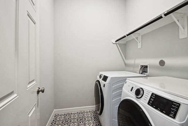 washroom with washer and clothes dryer