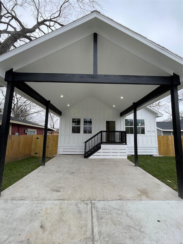 view of front of home featuring a carport