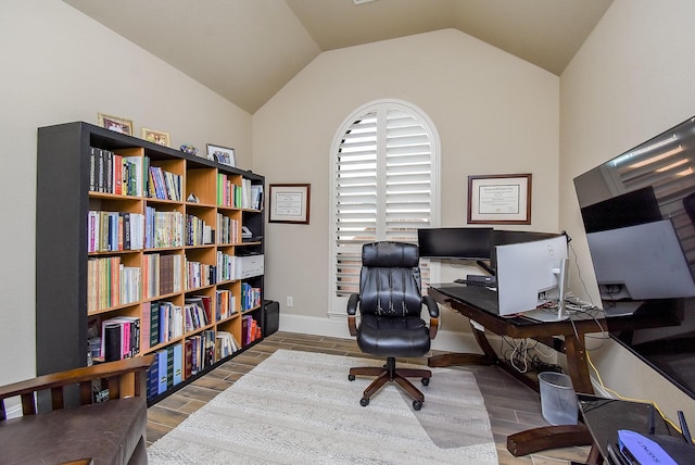 office space with vaulted ceiling