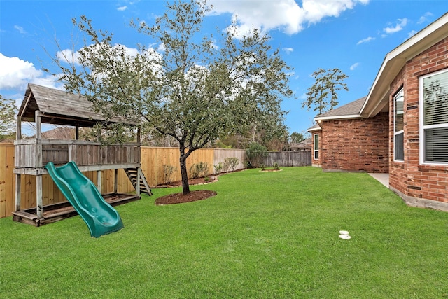 view of yard with a playground