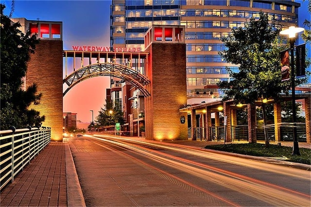 view of outdoor building at dusk