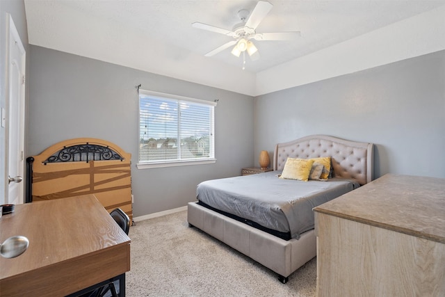 bedroom featuring ceiling fan and light colored carpet