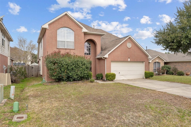 front of property featuring a garage and a front yard