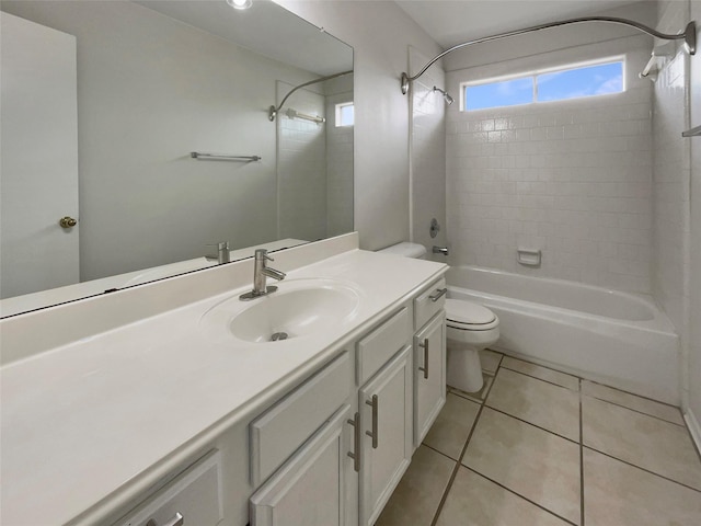 full bathroom with vanity, toilet, tile patterned floors, and tiled shower / bath