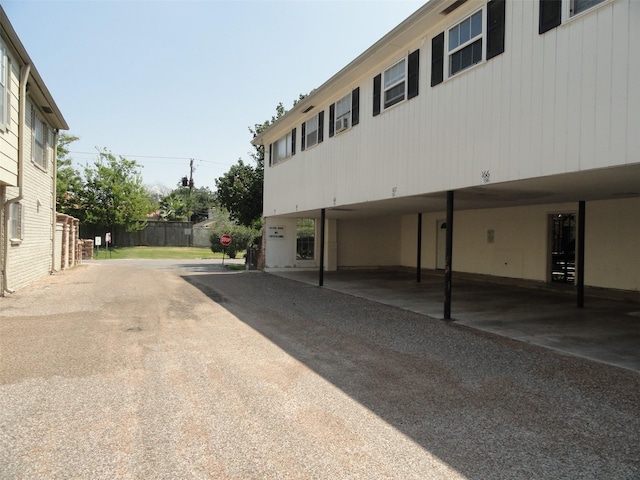 exterior space featuring a carport