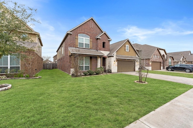 view of front of property featuring a garage and a front yard