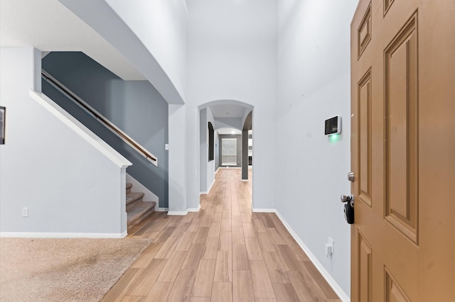 entryway with light hardwood / wood-style floors